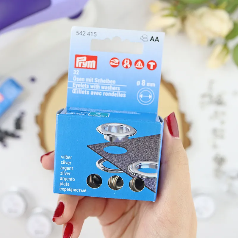 Set de 32 Ojales con Arandelas 8 mm de Prym Promoción
