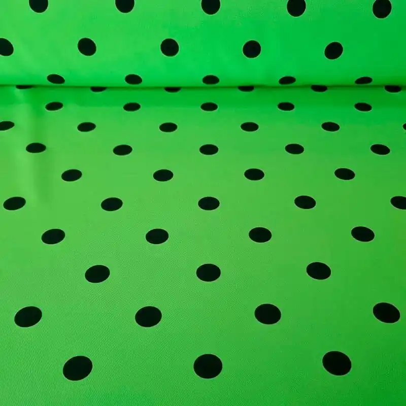 Oferta Limitada Tela Bielástica Verde Pistacho con Lunares Negros de 2cm (ancho 1,50M)